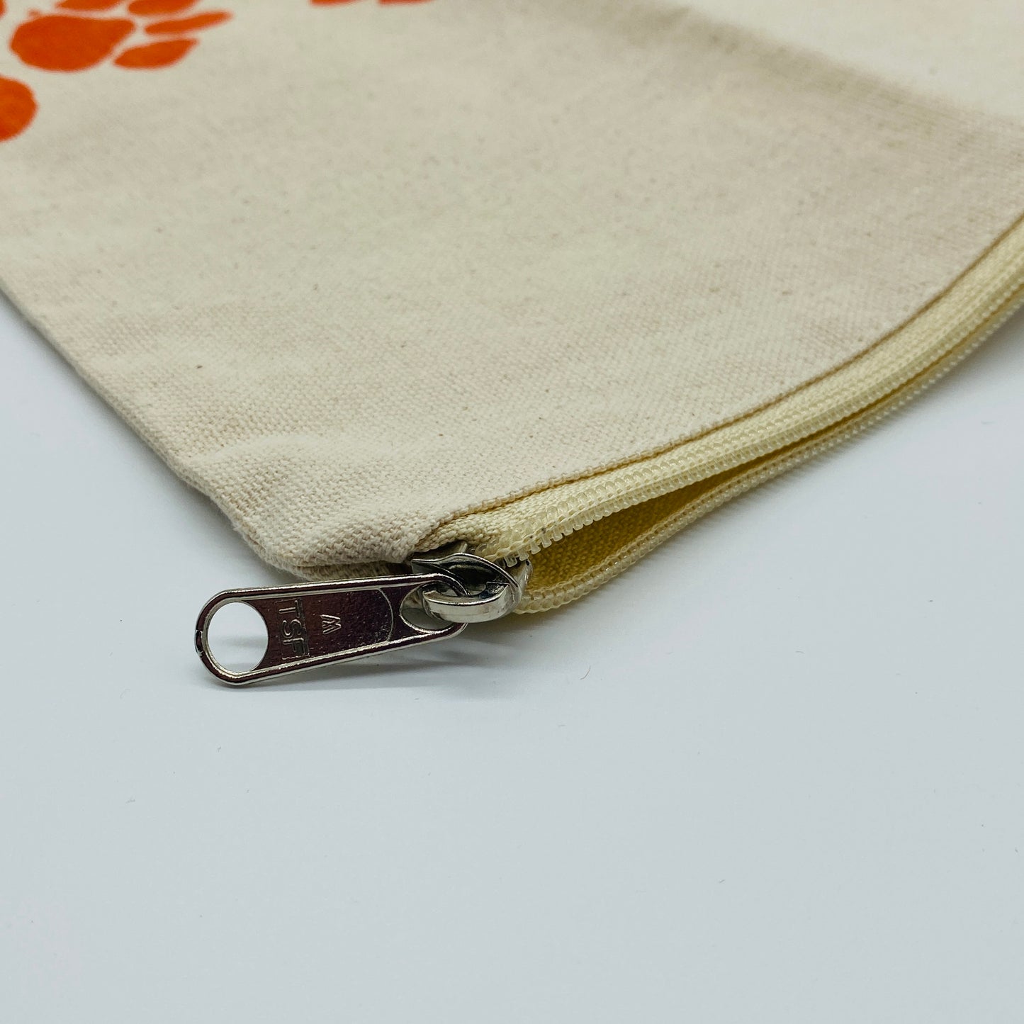 Natural Canvas Zippered Pouch with Orange Paw Prints