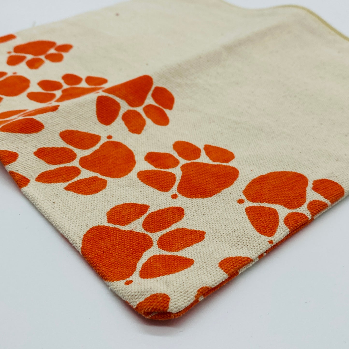 Natural Canvas Zippered Pouch with Orange Paw Prints