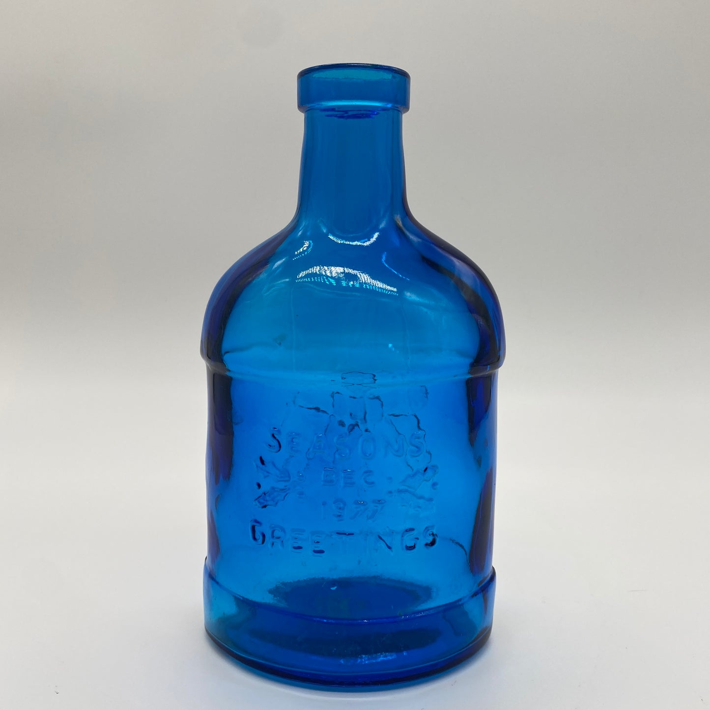 Blue Glass Season’s Greetings Bottle